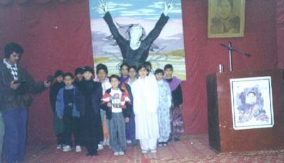 Students of RAWA's school singing patriotic songs at the function.