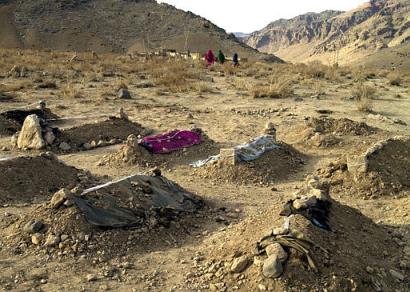 Graves of nine children killed by US air strike.