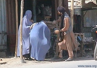 Taliban beating women in public