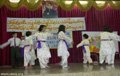 A group of orphans perform traditional dance of Afghanistan