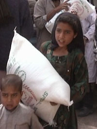 Smile in the face of a child who has received flour 