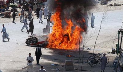 Protesters set on fire a police car