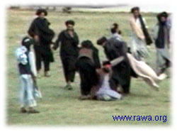 Taliban soldiers tied his hands behind his back