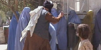 Taliban beating women in public